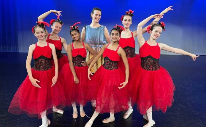 Group Picture of Studio Owner with Students